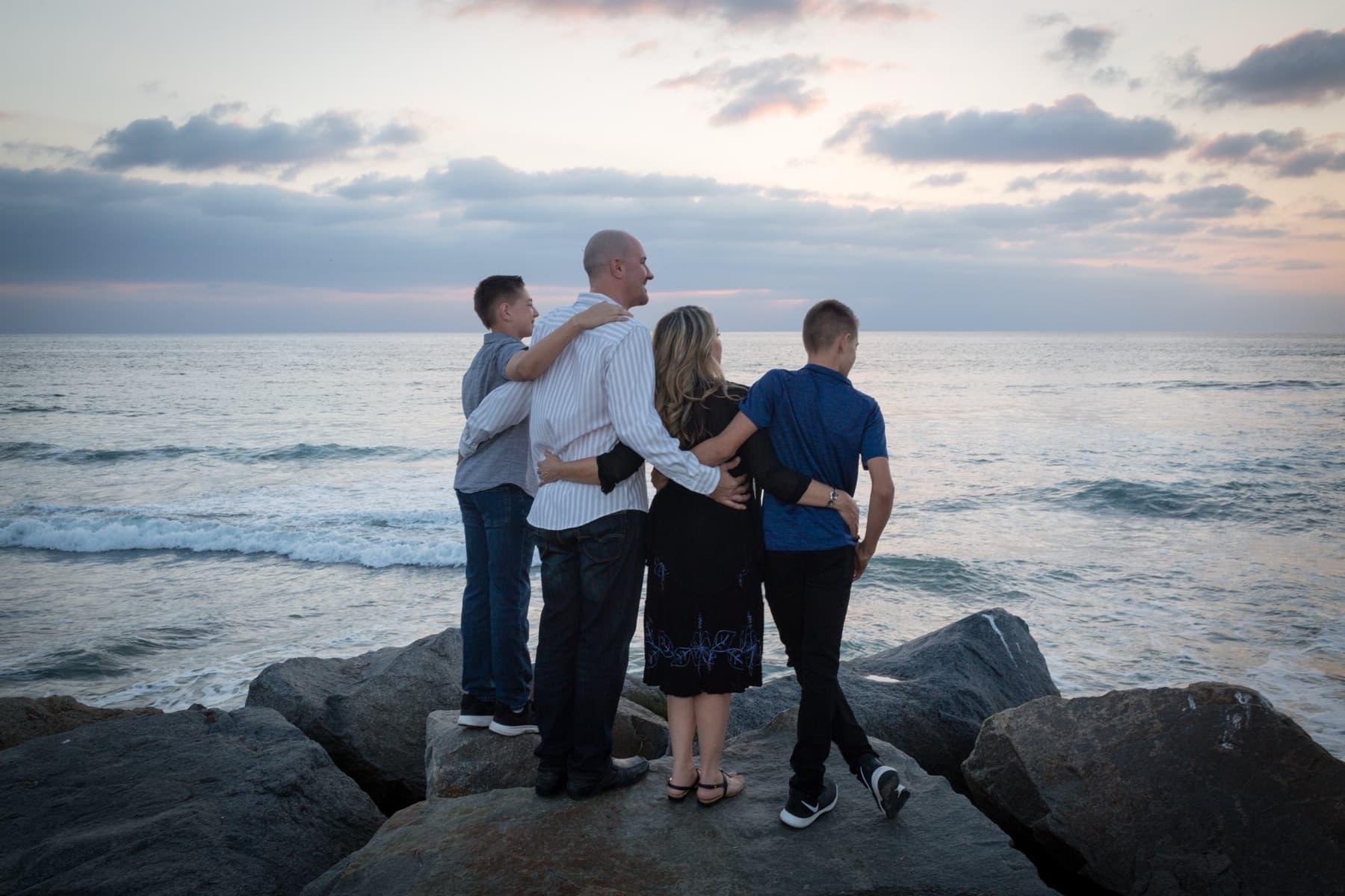 Ryan Perry with his family at the beach